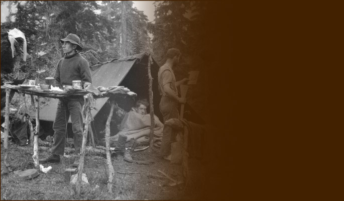Men among mountain campsite tents. Charles Chapman photo. Courtesy Lid Hawkins.