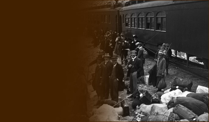 Climbers with gear alongside train. BCMC 40-37.