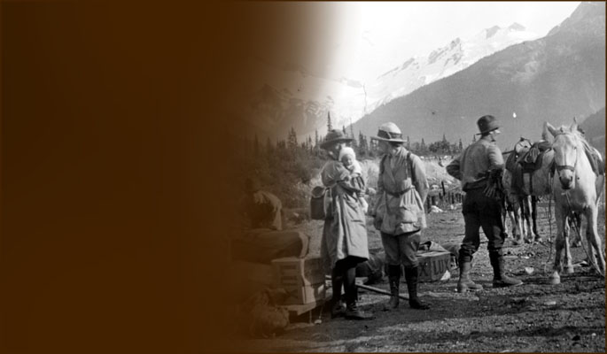 Climbers load packs on horses. Photo BCMC Archives 36-10.