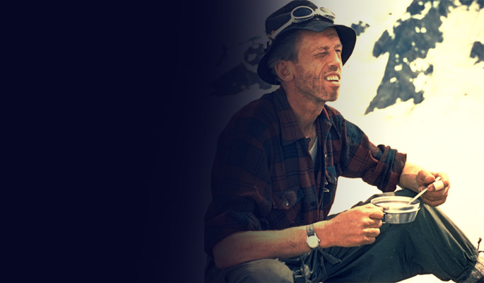 Photo-portrait of Paul Binkert amid snowy peaks, 1959. BCMC 70-06.