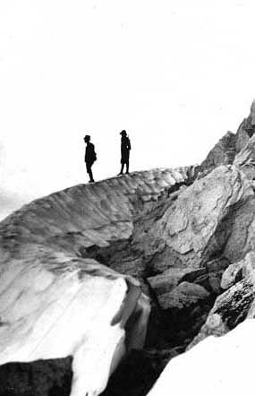 Climbers silhouetted on glacier ridge. Charles Chapman photo, courtesy Lid Hawkins and Hugh Kellas.