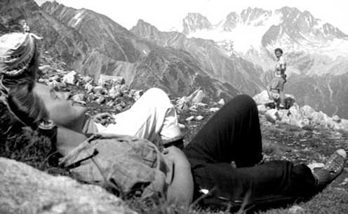 Women sunbath in mountain meadow. John T. Biller photo.