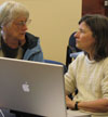 Volunteer advises archivist on oral history program