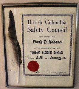 Certificate from British Columbia Safety Council for completion of a Tugboat Accident Safety course, framed with a feather.