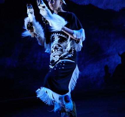 Teenage girl dancing in Gitxsan mountain goat regalia.