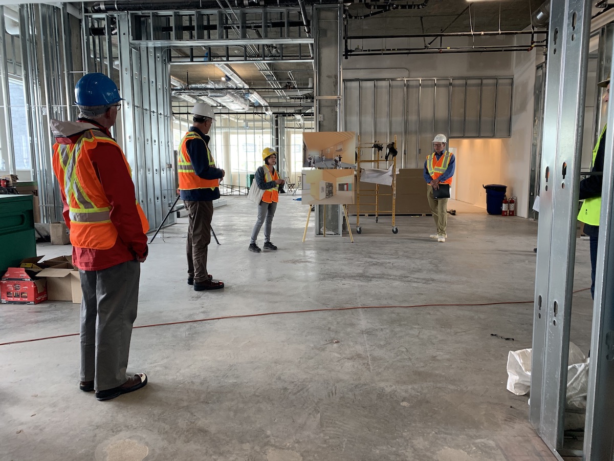 Curator Karen Dearlove and Director Wesley Wenhardt lead a group of community supporters through the new Museum on a break from construction on June 3, 2020. Photo: Stephen Irving 