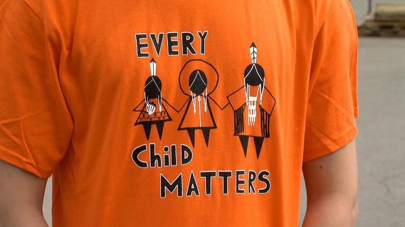 This year’s orange shirt is designed by Shayne Hommy, a Grade 11 First Nations Cree student at South Peace Secondary School in Dawson Creek. Photo: CFJC Today