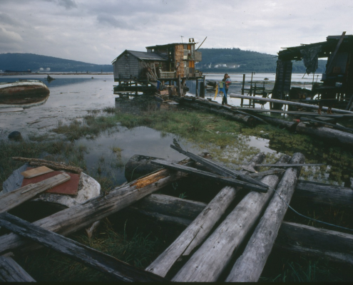 A wooden path leading to a squatter shack. Tony Westman took this photograph while working on the NFB film "Mudflats Living" in 1971. NVMA #15825
