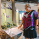 Carleen Thomas exploring the core exhibit gallery at the Museum of North Vancouver. Photo: Alison Boulier
