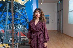 Guest Curator Nadin Hassan in MONOVA's Feature Exhibit Gallery. Photo: Alison Boulier