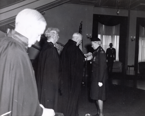 General Perks investing Mrs. Phyllis Munday as Commander Sister, St. John’s Ambulance, Nursing Division, at Government House in Victoria, BC, 15 May 1965. NVMA 5669